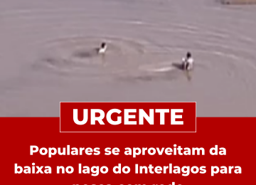 Populares se aproveitam da baixa do Lago do Interlagos para pesca com rede