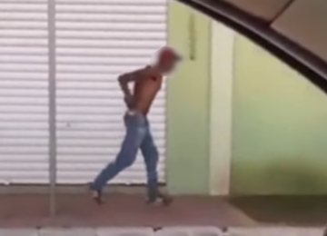 Homem é filmado fugindo algemado por ruas de Goiás