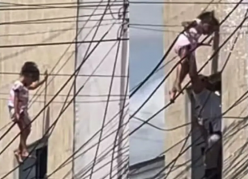 Policial salva menina de 4 anos que ficou pendurada em fios elétricos a 10 metros de altura, em Alagoas