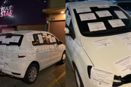 Comerciante admite excesso após colar papéis em carro de cliente em Goiânia