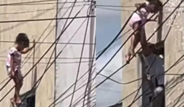 Policial salva menina de 4 anos que ficou pendurada em fios elétricos a 10 metros de altura, em Alagoas